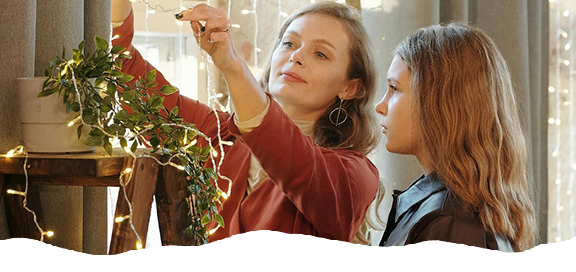 Woman and her teen child putting decorations up after successful BlueRock treatment