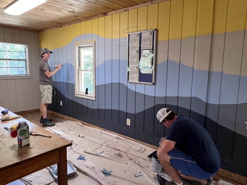 Staff painting the walls at BlueRock