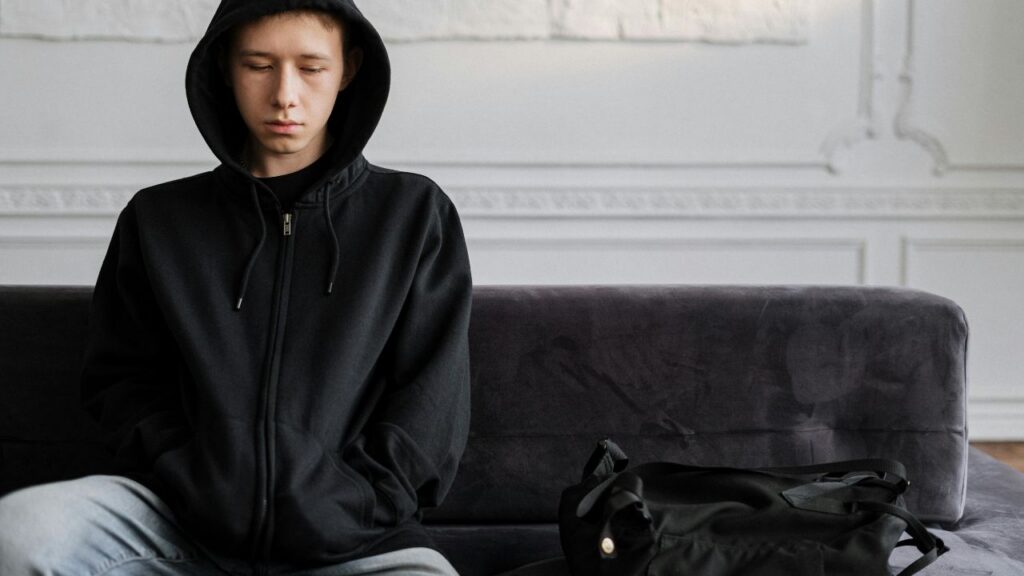 Shot of a teen that won't talk to their parents.